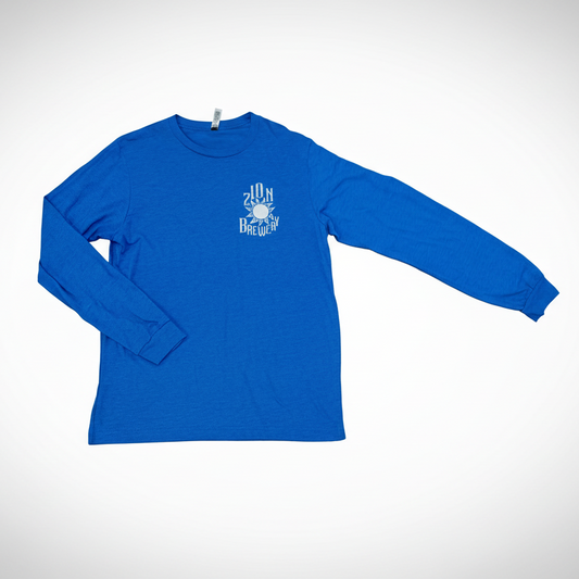 Blue long-sleeve shirt with a white graphic on a white background